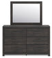 Hollivern King Panel Bed with Mirrored Dresser and Chest