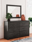 Hollivern King Panel Bed with Mirrored Dresser and Chest